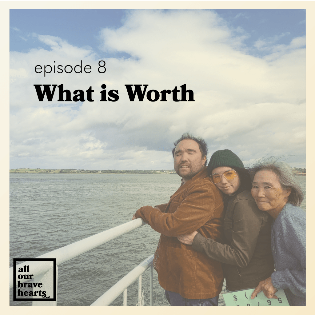 Background: Photo of Danny, his younger sister, and mom standing together on a ferry on the water. Danny is leaning against the railing, looking out toward the water. His sister and mom are behind him, hugging him with expressions of bliss and love on their faces. Text, bold black: episode 8, What is Worth. Lower left corner: thick black text says All Our Brave Hearts, in a black outline of a rectangle.