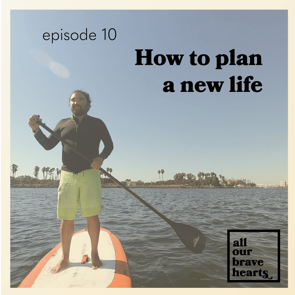 Background: Photo of Danny standing proudly on a red stand-up paddleboard in San Diego Bay, with palm trees and the skyline of downtown San Diego behind him. Black text: episode 10. How to Plan a New Life. Lower right: thick black text says All Our Brave Hearts, in a black outline of a rectangle.